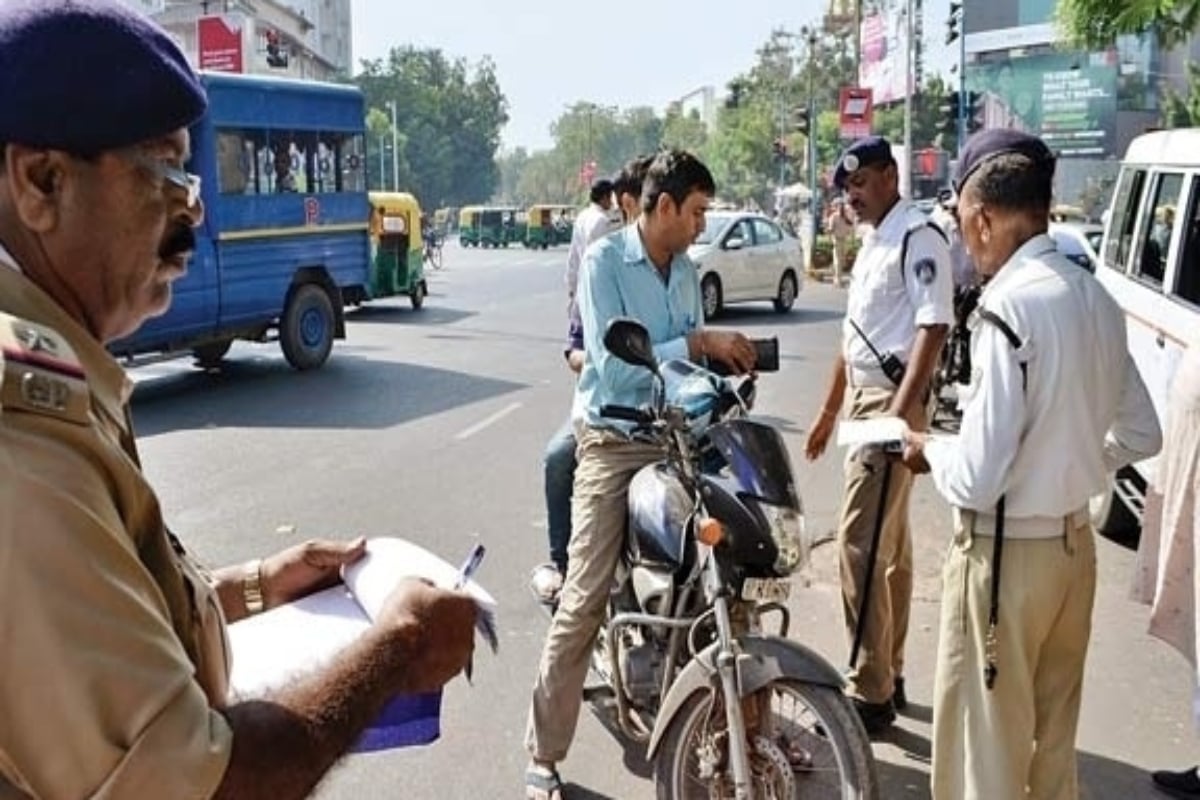 This free mobile app helps in avoiding challan, you will get alert when you jump red light
