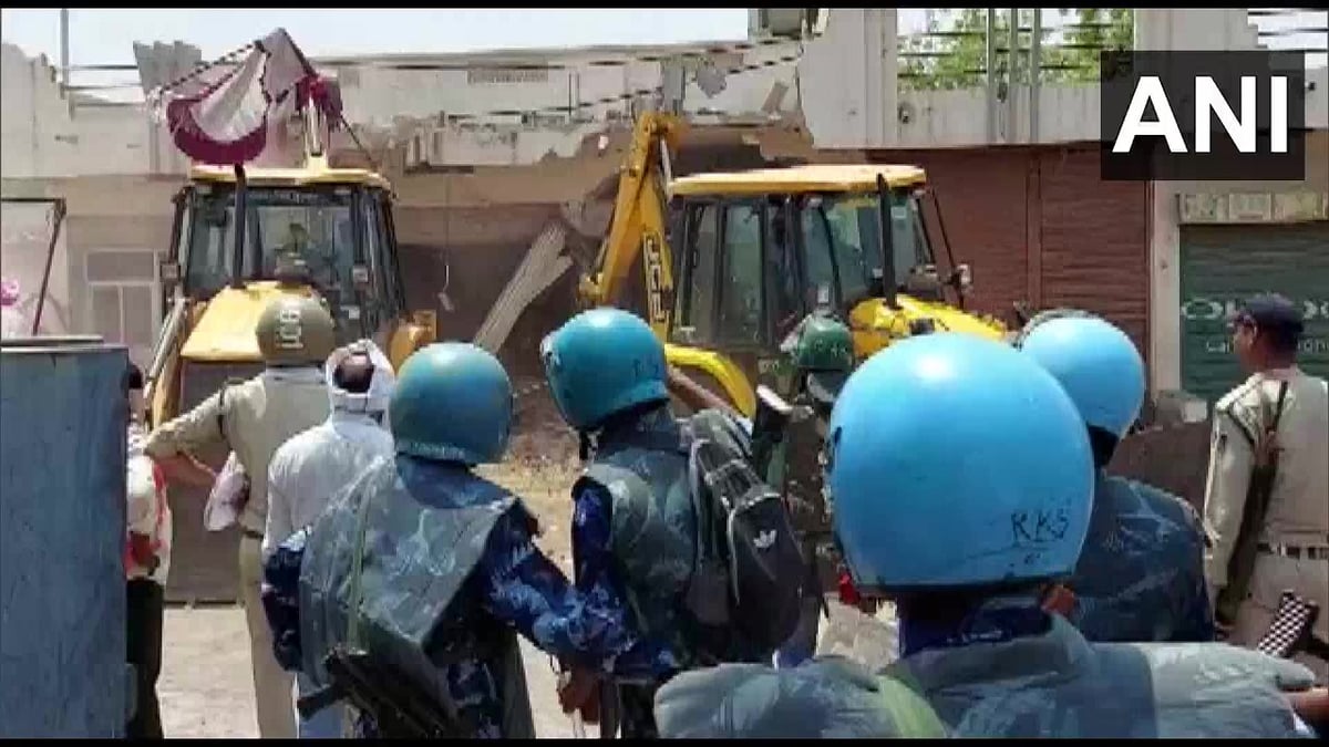 Rapid action in MP: Bulldozer rammed into house of three accused, 10 meat shops demolished