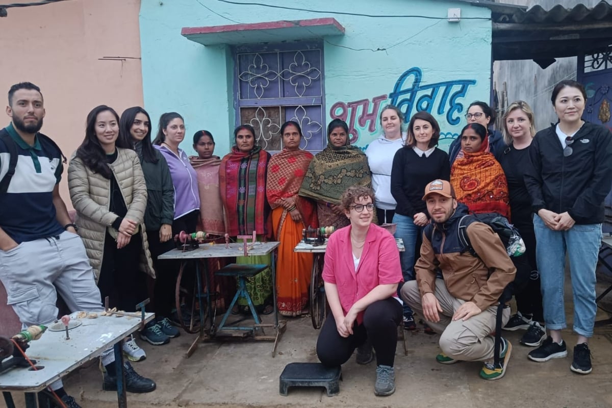 The team of French company Hermes is roaming from village to village in Dumka, learning the tricks of this technology from women.