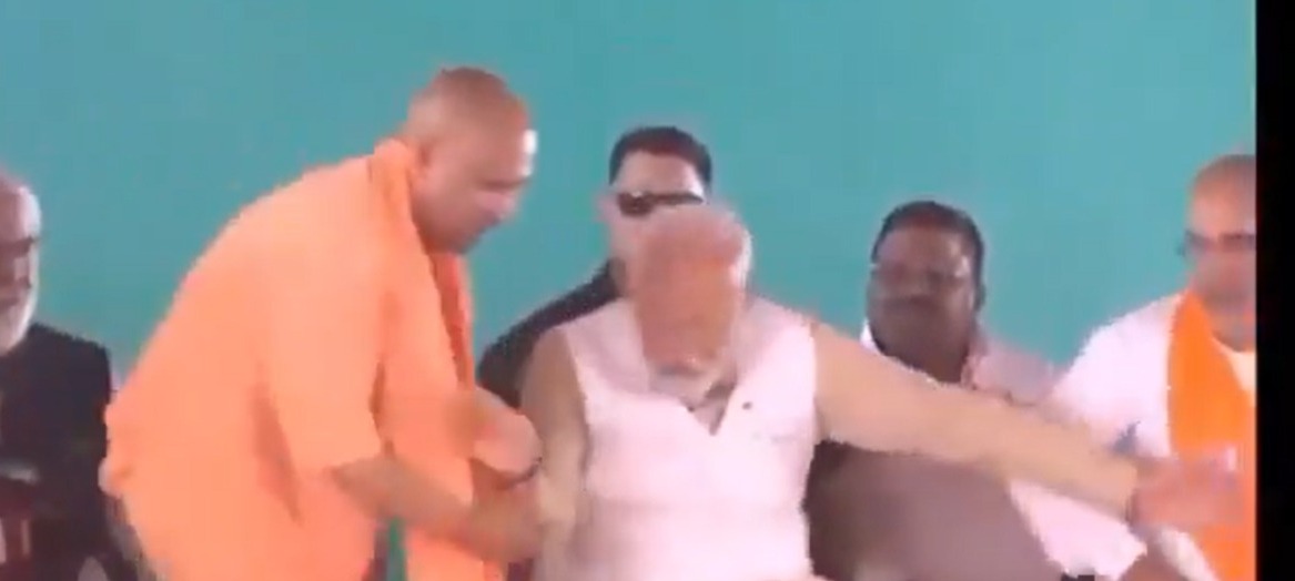 PM Modi Why did PM Modi hold CM Yogi's hand, know the reason